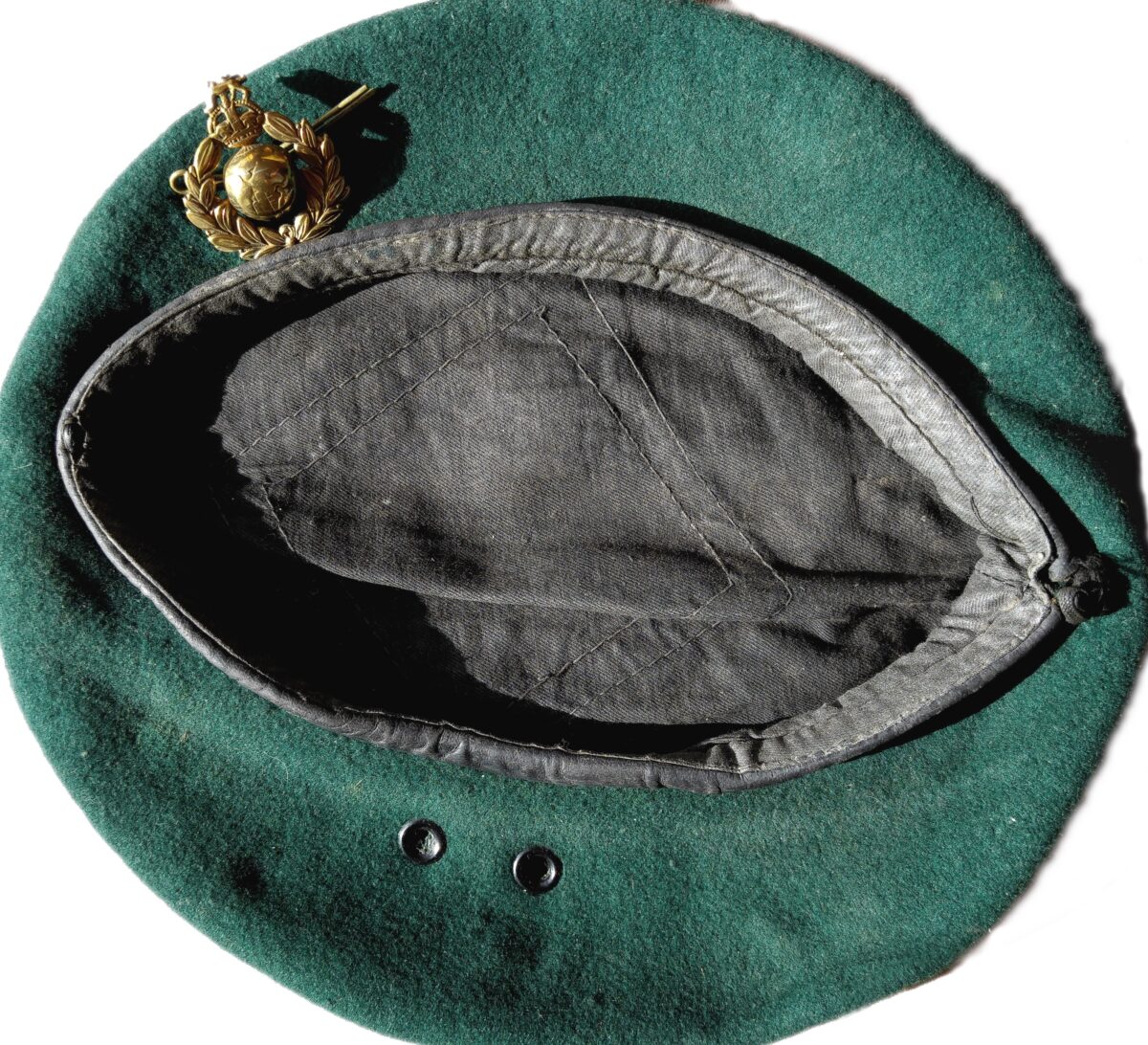 Cap with badge